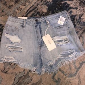 Brand new, tags on- high waisted shorts. Size 30.